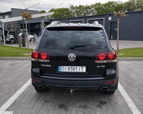 Чорний Фольксваген Туарег, об'ємом двигуна 3 л та пробігом 258 тис. км за 11500 $, фото 5 на Automoto.ua