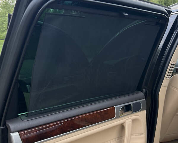 Черный Фольксваген Туарег, объемом двигателя 3 л и пробегом 235 тыс. км за 13500 $, фото 23 на Automoto.ua