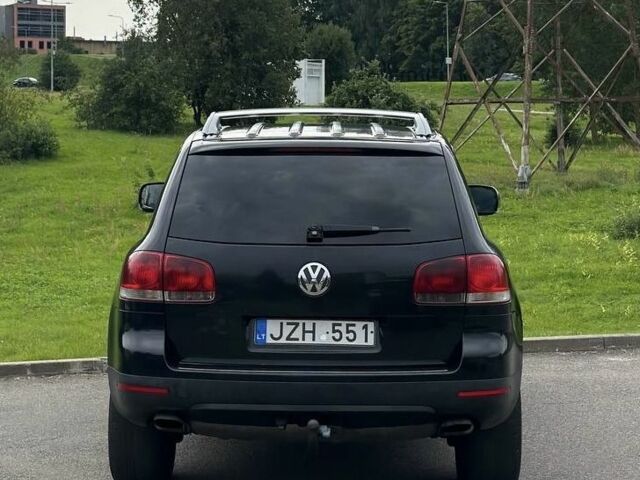 Черный Фольксваген Туарег, объемом двигателя 3 л и пробегом 281 тыс. км за 4999 $, фото 5 на Automoto.ua