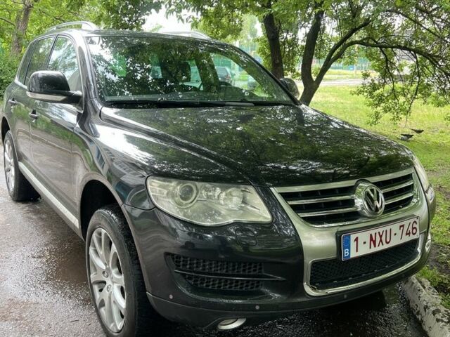 Черный Фольксваген Туарег, объемом двигателя 3 л и пробегом 278 тыс. км за 7500 $, фото 1 на Automoto.ua