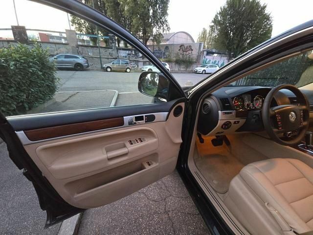 Черный Фольксваген Туарег, объемом двигателя 3 л и пробегом 287 тыс. км за 3259 $, фото 5 на Automoto.ua