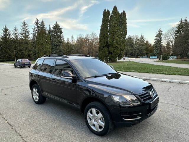 Чорний Фольксваген Туарег, об'ємом двигуна 3 л та пробігом 221 тис. км за 9800 $, фото 3 на Automoto.ua