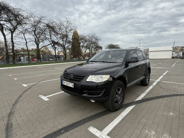 Черный Фольксваген Туарег, объемом двигателя 3 л и пробегом 263 тыс. км за 12500 $, фото 4 на Automoto.ua