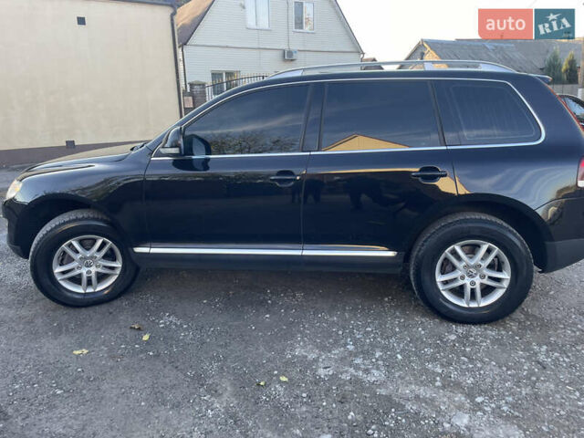 Черный Фольксваген Туарег, объемом двигателя 2.97 л и пробегом 279 тыс. км за 11000 $, фото 10 на Automoto.ua