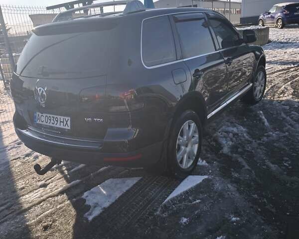 Черный Фольксваген Туарег, объемом двигателя 2.97 л и пробегом 294 тыс. км за 13000 $, фото 7 на Automoto.ua
