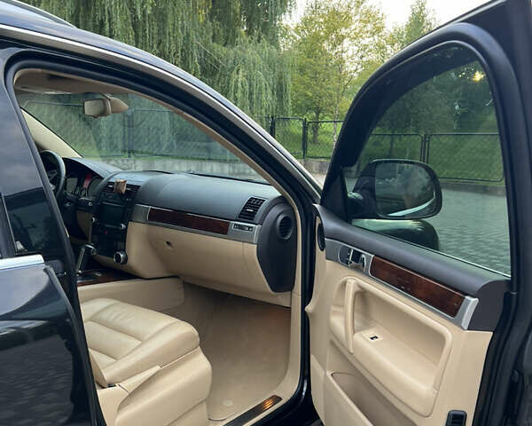 Черный Фольксваген Туарег, объемом двигателя 3 л и пробегом 235 тыс. км за 13500 $, фото 33 на Automoto.ua