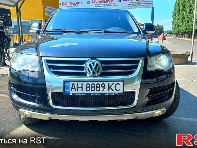 Чорний Фольксваген Туарег, об'ємом двигуна 3 л та пробігом 292 тис. км за 11500 $, фото 1 на Automoto.ua