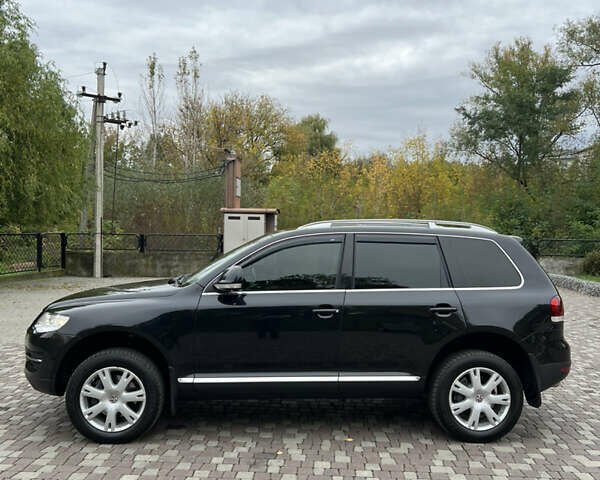 Черный Фольксваген Туарег, объемом двигателя 3 л и пробегом 235 тыс. км за 13500 $, фото 6 на Automoto.ua