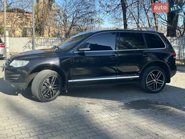 Черный Фольксваген Туарег, объемом двигателя 4.2 л и пробегом 286 тыс. км за 8999 $, фото 6 на Automoto.ua