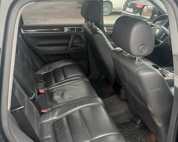 Фольксваген Туарег 2008 у Борисполе на Automoto.ua Чорний Фольксваген Туарег, об'ємом двигуна 3 л та пробігом 198 тис. км за 13000 $, фото 1 на Automoto.ua