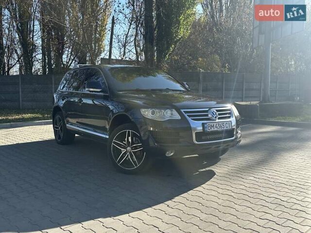 Черный Фольксваген Туарег, объемом двигателя 4.2 л и пробегом 286 тыс. км за 8999 $, фото 1 на Automoto.ua