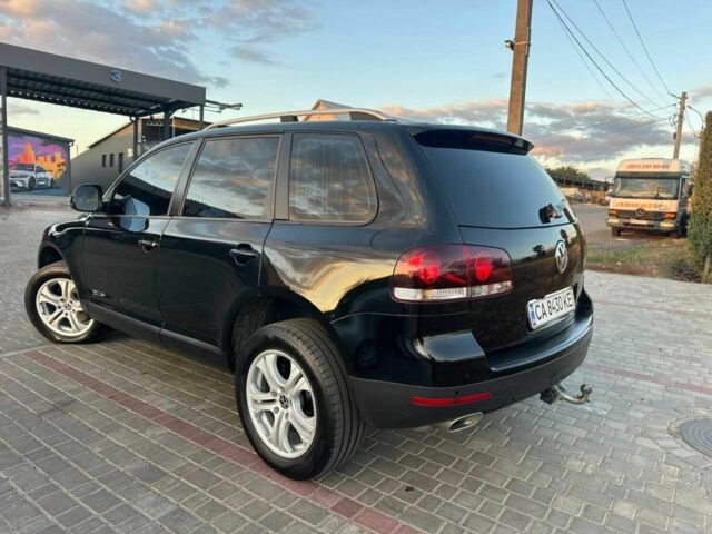 Черный Фольксваген Туарег, объемом двигателя 3 л и пробегом 198 тыс. км за 13086 $, фото 1 на Automoto.ua