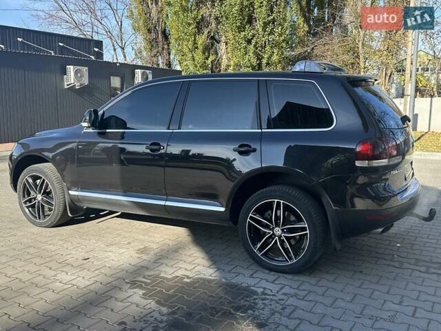Черный Фольксваген Туарег, объемом двигателя 4.2 л и пробегом 286 тыс. км за 8999 $, фото 56 на Automoto.ua