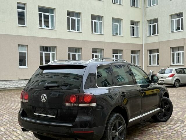 Чорний Фольксваген Туарег, об'ємом двигуна 3 л та пробігом 300 тис. км за 6490 $, фото 4 на Automoto.ua
