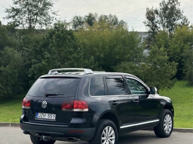 Черный Фольксваген Туарег, объемом двигателя 3 л и пробегом 281 тыс. км за 4999 $, фото 4 на Automoto.ua