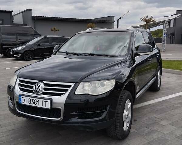 Чорний Фольксваген Туарег, об'ємом двигуна 3 л та пробігом 258 тис. км за 11500 $, фото 1 на Automoto.ua