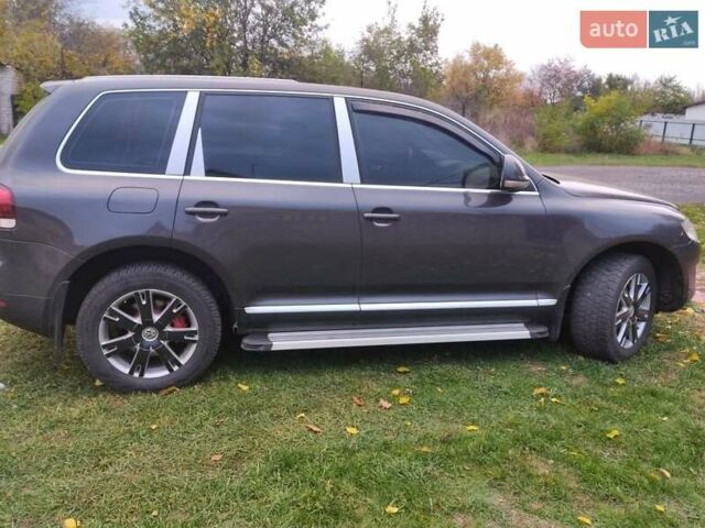 Черный Фольксваген Туарег, объемом двигателя 3 л и пробегом 300 тыс. км за 9300 $, фото 6 на Automoto.ua