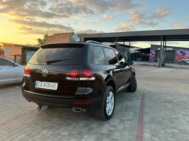 Черный Фольксваген Туарег, объемом двигателя 3 л и пробегом 198 тыс. км за 13086 $, фото 3 на Automoto.ua