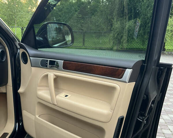 Черный Фольксваген Туарег, объемом двигателя 3 л и пробегом 235 тыс. км за 13500 $, фото 34 на Automoto.ua