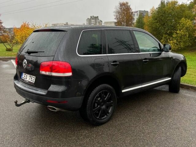 Черный Фольксваген Туарег, объемом двигателя 3 л и пробегом 280 тыс. км за 4900 $, фото 4 на Automoto.ua