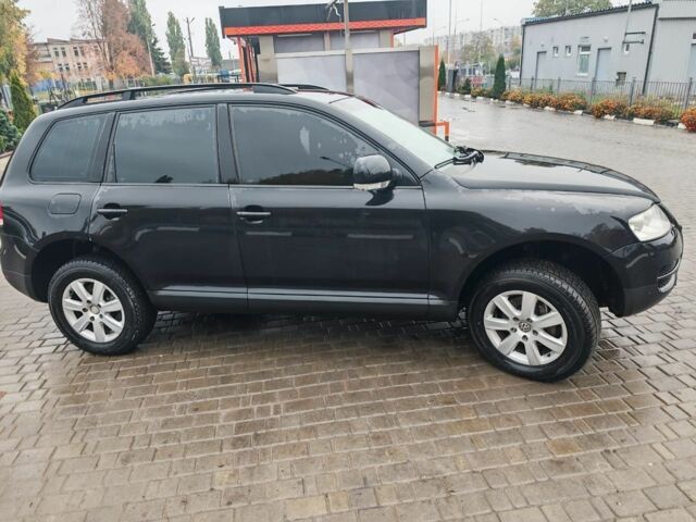 Черный Фольксваген Туарег, объемом двигателя 3 л и пробегом 397 тыс. км за 7700 $, фото 1 на Automoto.ua