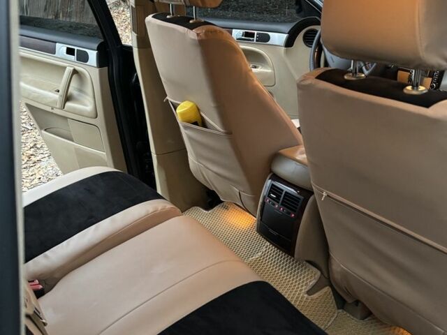 Черный Фольксваген Туарег, объемом двигателя 3 л и пробегом 335 тыс. км за 7500 $, фото 5 на Automoto.ua