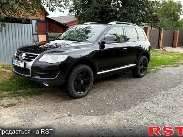 Чорний Фольксваген Туарег, об'ємом двигуна 3 л та пробігом 265 тис. км за 13000 $, фото 1 на Automoto.ua