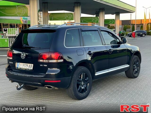 Черный Фольксваген Туарег, объемом двигателя 3 л и пробегом 258 тыс. км за 10800 $, фото 2 на Automoto.ua