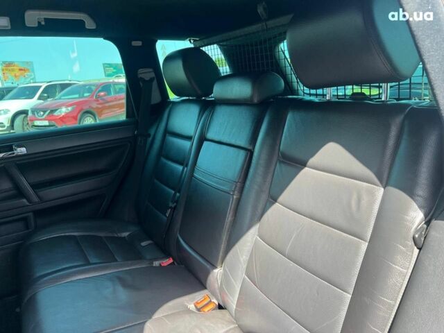 Черный Фольксваген Туарег, объемом двигателя 2.5 л и пробегом 336 тыс. км за 11990 $, фото 27 на Automoto.ua