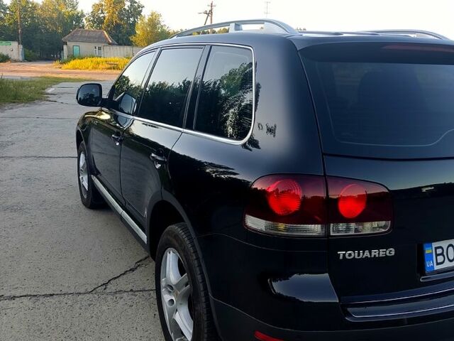 Чорний Фольксваген Туарег, об'ємом двигуна 3 л та пробігом 297 тис. км за 11777 $, фото 3 на Automoto.ua
