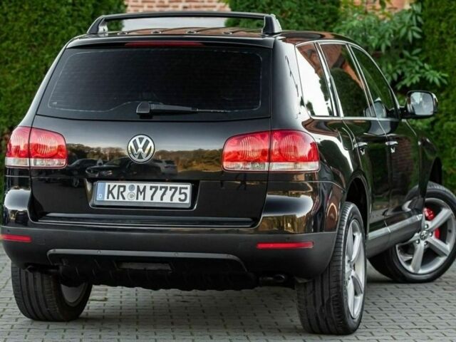 Черный Фольксваген Туарег, объемом двигателя 3 л и пробегом 240 тыс. км за 4000 $, фото 4 на Automoto.ua