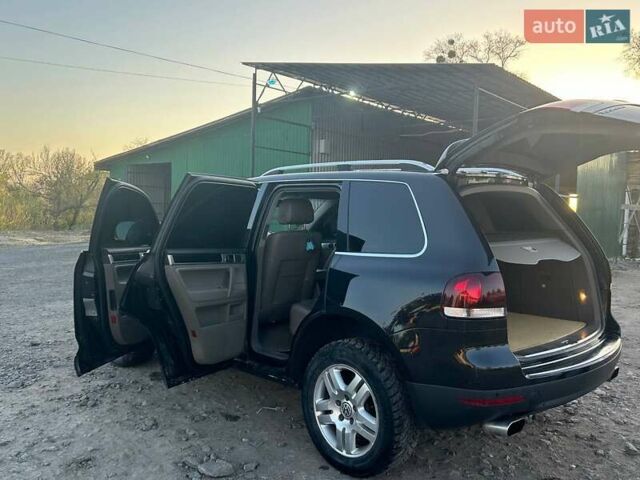 Чорний Фольксваген Туарег, об'ємом двигуна 3 л та пробігом 283 тис. км за 12200 $, фото 3 на Automoto.ua