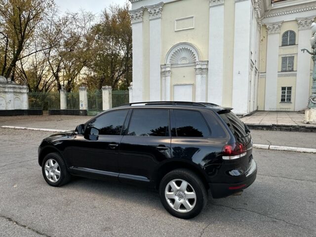 Чорний Фольксваген Туарег, об'ємом двигуна 3 л та пробігом 221 тис. км за 9800 $, фото 4 на Automoto.ua