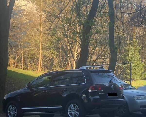 Черный Фольксваген Туарег, объемом двигателя 3 л и пробегом 270 тыс. км за 11500 $, фото 3 на Automoto.ua