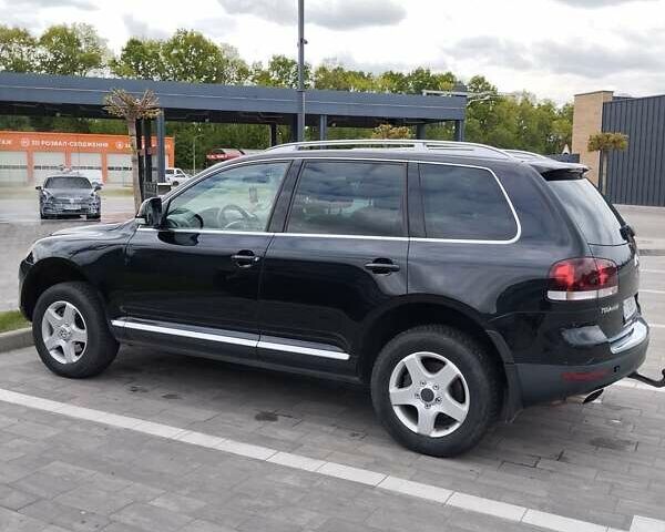 Чорний Фольксваген Туарег, об'ємом двигуна 3 л та пробігом 258 тис. км за 11500 $, фото 7 на Automoto.ua