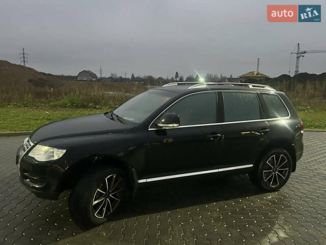 Черный Фольксваген Туарег, объемом двигателя 2.97 л и пробегом 159 тыс. км за 13800 $, фото 2 на Automoto.ua