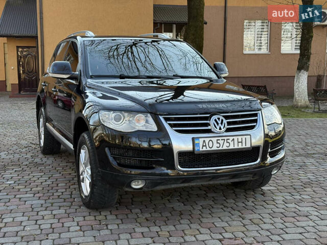 Черный Фольксваген Туарег, объемом двигателя 3 л и пробегом 314 тыс. км за 10500 $, фото 1 на Automoto.ua