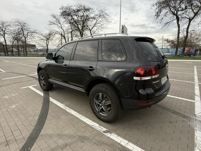 Черный Фольксваген Туарег, объемом двигателя 3 л и пробегом 263 тыс. км за 12500 $, фото 5 на Automoto.ua