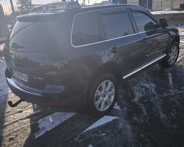Черный Фольксваген Туарег, объемом двигателя 2.97 л и пробегом 294 тыс. км за 13000 $, фото 4 на Automoto.ua