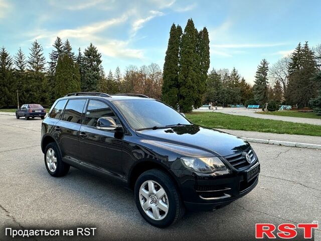 Фольксваген Туарег 2008 в Желтых Водах на Automoto.ua Черный Фольксваген Туарег, объемом двигателя 3 л и пробегом 221 тыс. км за 9800 $, фото 1 на Automoto.ua