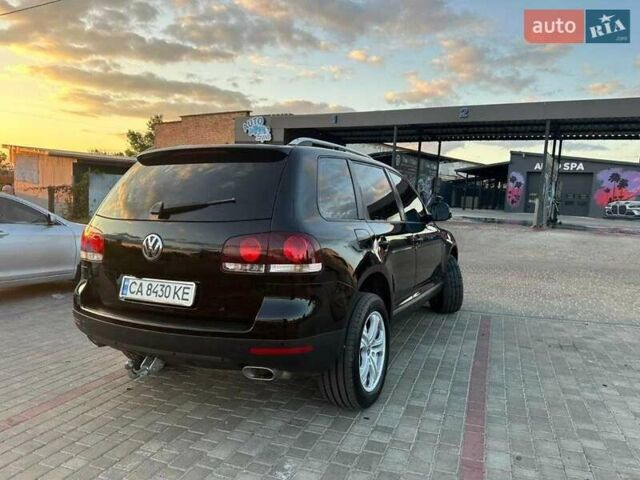 Черный Фольксваген Туарег, объемом двигателя 3 л и пробегом 198 тыс. км за 13086 $, фото 2 на Automoto.ua