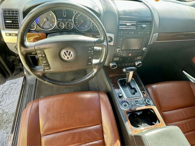 Фольксваген Туарег 2009 в Ровно на Automoto.ua Черный Фольксваген Туарег, объемом двигателя 3 л и пробегом 254 тыс. км за 6800 $, фото 12 на Automoto.ua