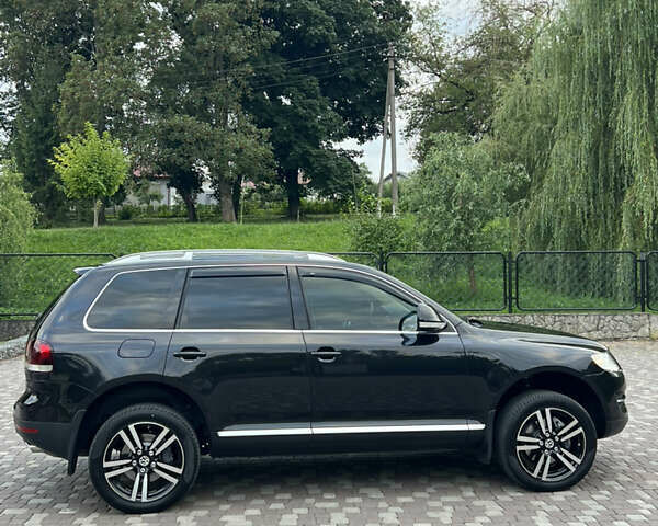 Черный Фольксваген Туарег, объемом двигателя 2.97 л и пробегом 235 тыс. км за 15200 $, фото 12 на Automoto.ua