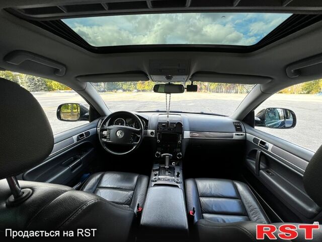 Черный Фольксваген Туарег, объемом двигателя 3 л и пробегом 325 тыс. км за 13000 $, фото 2 на Automoto.ua