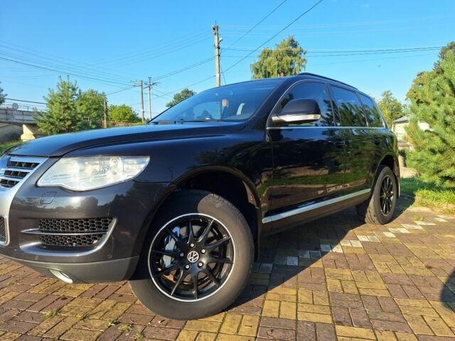 Черный Фольксваген Туарег, объемом двигателя 3.6 л и пробегом 305 тыс. км за 12800 $, фото 1 на Automoto.ua