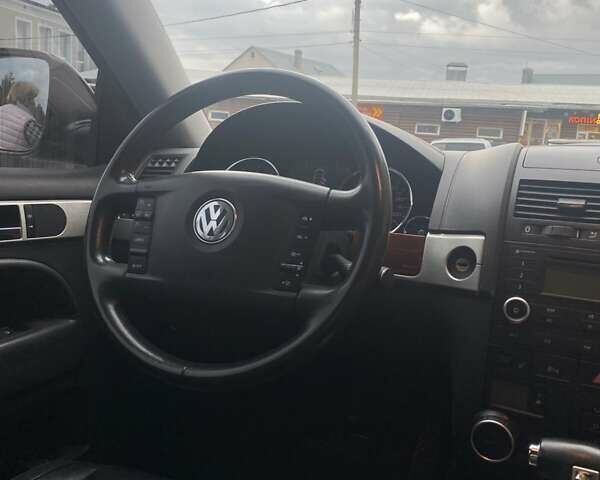 Черный Фольксваген Туарег, объемом двигателя 3.6 л и пробегом 148 тыс. км за 14000 $, фото 17 на Automoto.ua