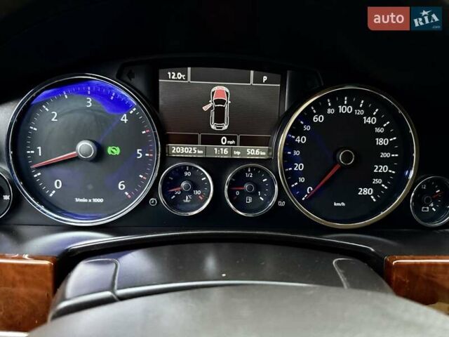 Черный Фольксваген Туарег, объемом двигателя 3 л и пробегом 203 тыс. км за 10999 $, фото 1 на Automoto.ua