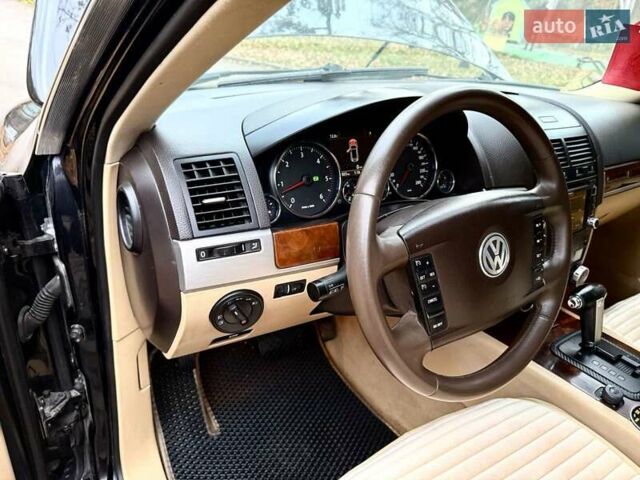 Черный Фольксваген Туарег, объемом двигателя 3 л и пробегом 203 тыс. км за 10999 $, фото 6 на Automoto.ua