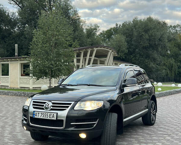 Черный Фольксваген Туарег, объемом двигателя 2.97 л и пробегом 235 тыс. км за 15200 $, фото 2 на Automoto.ua
