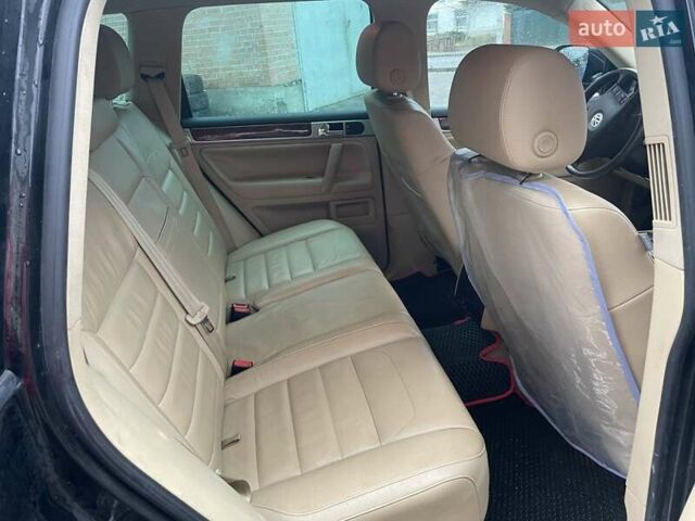 Черный Фольксваген Туарег, объемом двигателя 2.97 л и пробегом 348 тыс. км за 12500 $, фото 12 на Automoto.ua